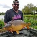 HERE IS STEVE BOURNE WITH A 31LB MIRROR HIS NEW (PB)