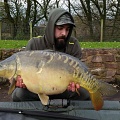 HERE IS KHAN TEECE WITH A 25LB 4OZ MIRROR, CAUGHT FROM PEG (1) 