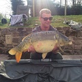 HERE IS ROB SEDDON WITH A 22LB 1oz MIRROR,CAUGHT FROM PEG 12.