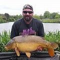 HERE IS STEVEN BOURNE WITH A CORKING 22LB MIRROR CAUGHT FROM PEG 1.