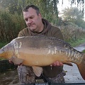 HERE IS STEVE WALKER WITH A 21LB MILLBROOK  MIRROR,CAUGHT FROM PEG (2) WELL DONE STEVE GOOD ANGLING MATE.